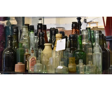 A large collection of vintage bottles.