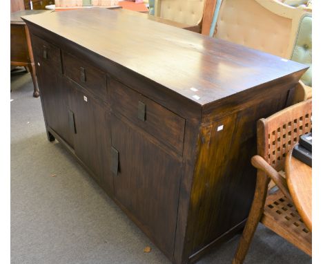 A modern Oriental style sideboard, three drawers with flat metal handles above three cupboards with shelf (165.5cm x 96cm hig