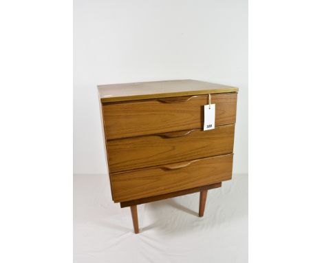 A vintage Europa Furniture three drawer bedside table.