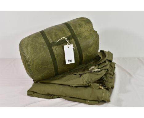 Two army rain cape/half tent, believed to be British army - date unknown and a British army sleeping bag.