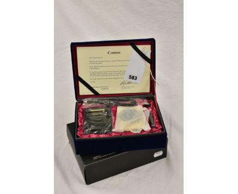 A Canon Ixus Elph IX240 camera, limited edition 60th anniversary No 4664. With box, instructions and certificate. 