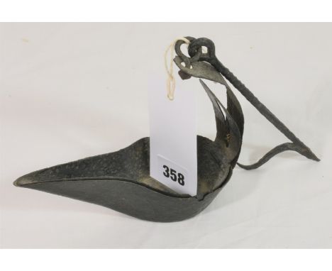 An antique cresset lamp.