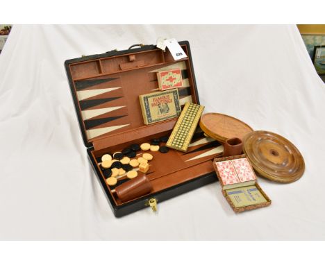 A collection of vintage games to include backgammon; 'Alfa-kubes'; 'Kan-you-go'; 'Famous paintings' cards; plus assorted game