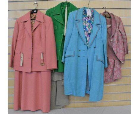 A quantity of vintage ladies suits comprising of a turquoise Harrods Mansfield skirt suit together with a three piece pink an