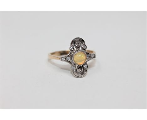 An 18ct gold opal and diamond ring