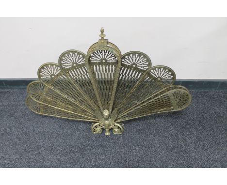A 20th century brass fan fire screen  