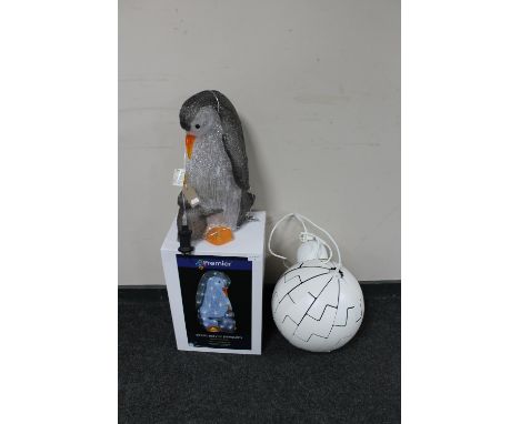 Two Christmas acrylic penguins (one boxed), together with an Ikea globe light fitting 