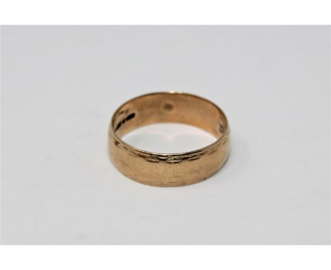 A 9ct gold band ring CONDITION REPORT: 4.6g