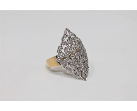 An 18ct gold diamond panel ring