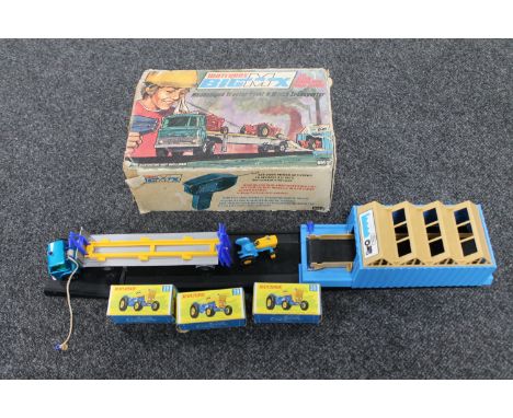 A boxed Matchbox Big MX mechanised tractor plant and winch transporter 