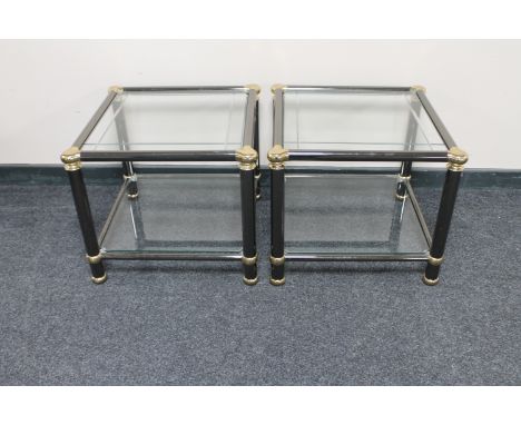 A pair of metal and glass lamp tables 