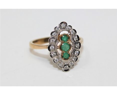 A 9ct gold emerald and diamond ring