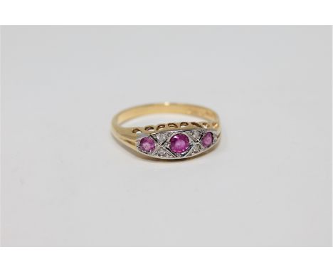 An 18ct gold ruby and diamond ring