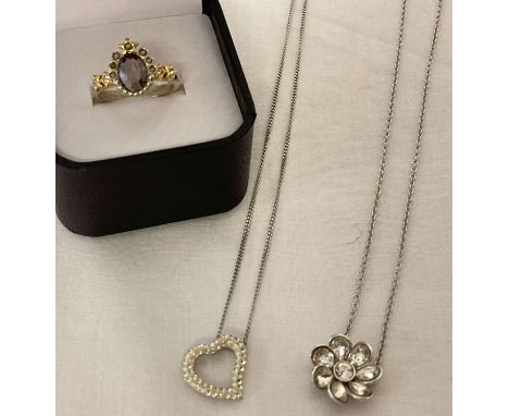 3 items of Swarovski jewellery all with the Swarovski swan mark.  A flower pendant necklace set with clear crystals, a floati