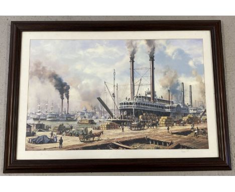 Large framed and glazed print of an American harbour scene depicting paddle steamers.   Frame size approx. 60 x 85cm.