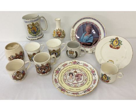 A collection of ceramic commemorative ware mugs, plates and a vase.  To include Edward VII, Elizabeth II, Charles and Diana a