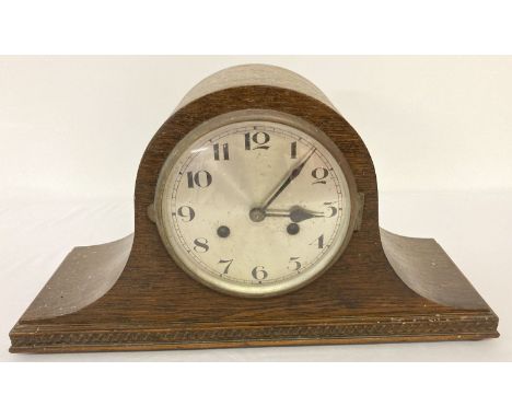 A vintage dark oak cased Napoleons hat mantel clock with striking action.  No key or pendulum. 