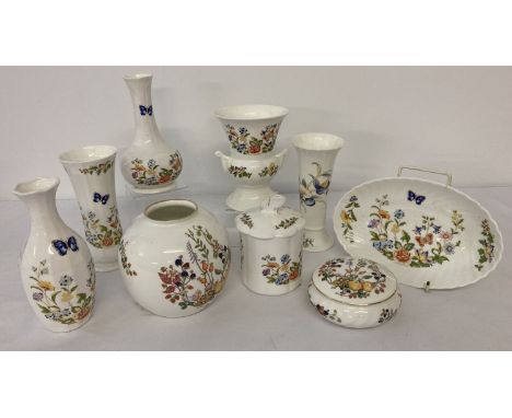 9 pieces of Aynsley ceramics in Cottage Garden, Somerset and Just Orchids patterns.  To include vases, lidded trinket pots an