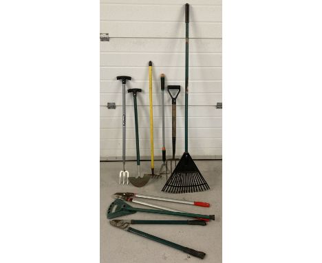 A selection of modern garden tools. To include a "Flipstick" seat, lawn rake, lawn edging shears and  garden forks. 