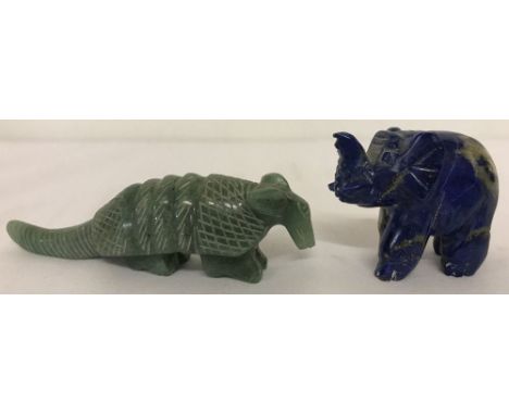 A carved jade armadillo figure together with a carved lapis lazuli elephant.  