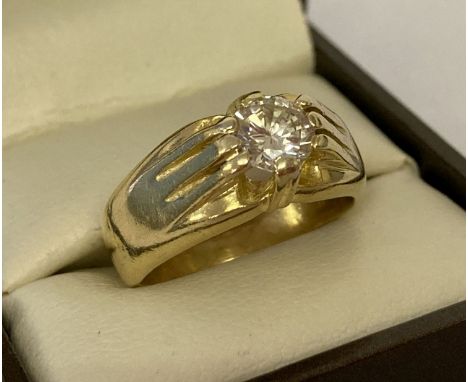 A men's 18ct gold diamond solitaire gypsy style ring. Diamond size approx. .80ct. Ring size P½. Total weight approx. 11g.