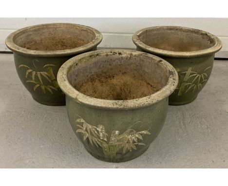 3 large ceramic garden planters with green glaze and bamboo decoration to fronts.  One planter has chip to front rim.  All ap