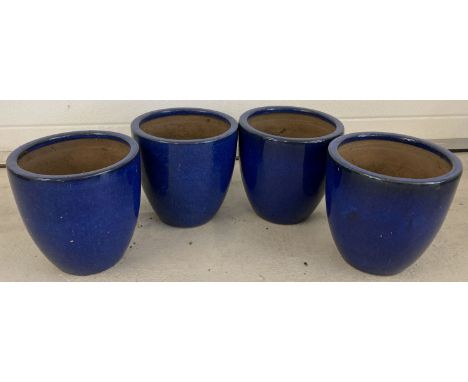 4 matching blue glaze ceramic garden planter pots.   Approx. 27cm tall x 27cm diameter.