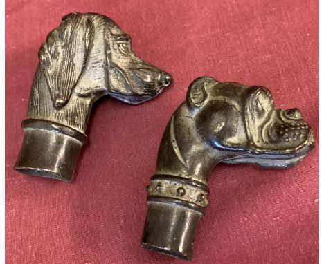 2 bronze walking cane handles in the shape of dogs heads.   Approx. 7cm tall.