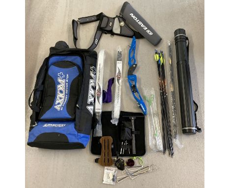 An archery bow and accessories in an Axiom + archery bag.  Accessories to include: riser by Premium, upper and lower limbs by