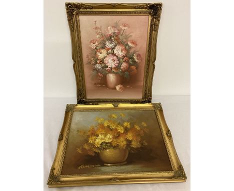 2 gilt framed oil on canvas paintings of still life flowers. Both pictures signed to bottom left.  Pink carnations signed K. 