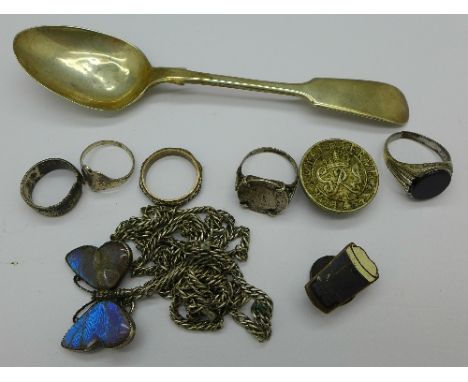 A white metal spoon, jewellery including silver and two button hole badges, For Loyal Service and Guinness