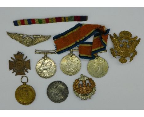 A WWI Victory medal to 1384 Pte. H. Biss 10-Lond.R. and a War medal to Pte. G. Biss Devon R., a German 1914-1918 cross medal,