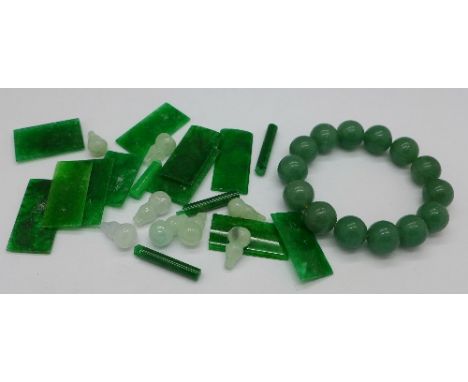 Unmounted jade and a bracelet