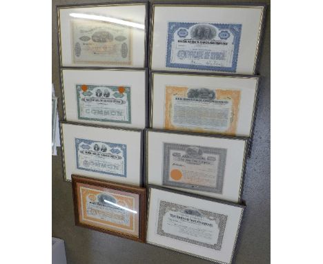 A collection of eleven framed and mounted American share certificates, three others, three $1 notes and a 19th Century delive