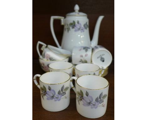 A Royal Worcester six setting coffee service, June Garland pattern