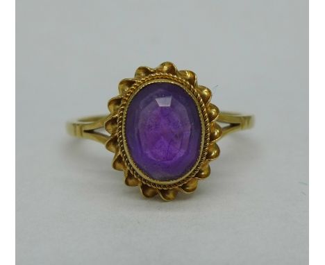 A 9ct gold and amethyst ring, 2.5g, R