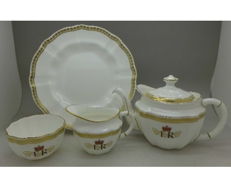A Royal Crown Derby three piece tea service celebrating The Queen's Diamond Jubilee and a Carlton Gold plate, plate a second