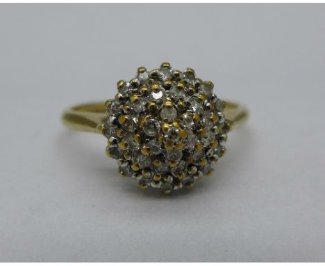 A 9ct gold and diamond cluster ring, 2g, K
