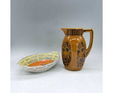 RCW Bavaria porcelain reticulated oval bowl, white on the outside, lustreware orange and yellow on the inner surface, black r