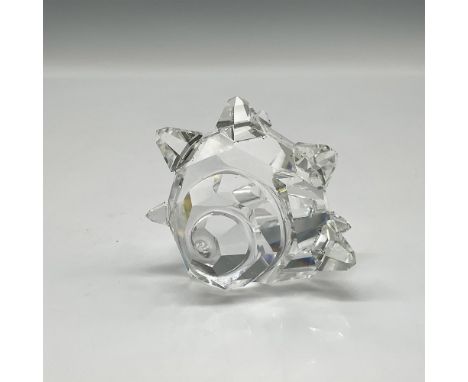 Part of the South Sea collection. Clear faceted figure of a seashell with spiky protrusions. Swarovski backstamp. 160798. Thi