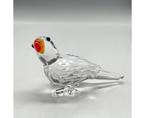 Faceted clear crystal body with a stunning Fire Opal beak. Swarovski backstamp. 294047. This item has its original box which 