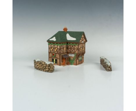 This figure shows a rustic village shop in a winter setting. This item has its original box. Original box's dimensions: 9.5"L