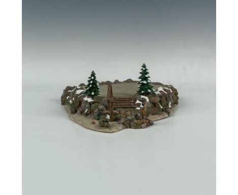 Detailed ceramic platform designed with rocks, trees and flat platform. This item has its original box: 16.5"L x 4.5"W x 16"H