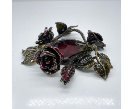 This gorgeous candle platform features entwined roses and vines, crafted in luscious deep jewel reds and greens. Each blossom