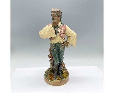 Hand made and hand decorated figural vase of a mustached man with a pipe. BB 624 impressed on the underside. Dimensions: 5.75