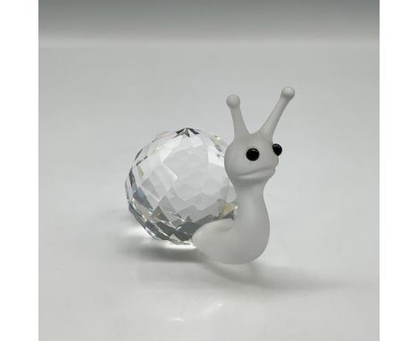Charming figural with clear crystal shell and frosted crystal body looking forward with black crystal eyes. Swarovski backsta