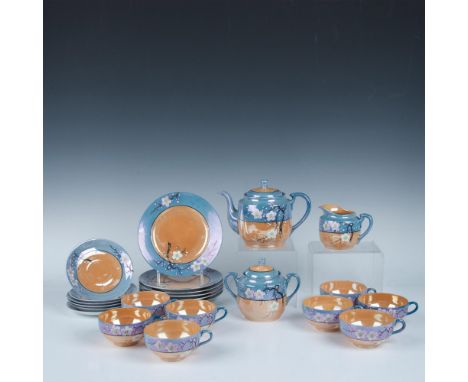 Tea set in blue and orange decorated with hand-painted cherry blossoms. Made In Japan backstamp. Eight tea cups, six saucers,