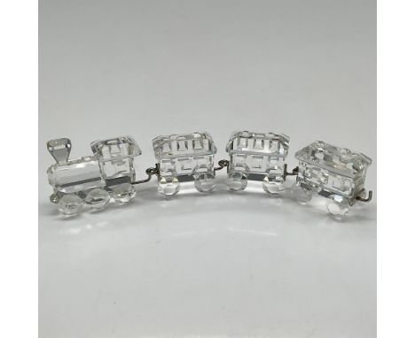 Depicts a clear crystal locomotive with three carriages. Swarovski backstamp. 193014. This item has its original box: 3.25"H 