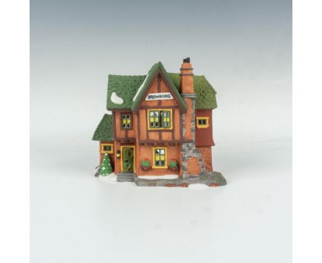 A rustic terracotta-colored cottage during the winter. This item has its original box. The original box's dimensions: 10.5"L 