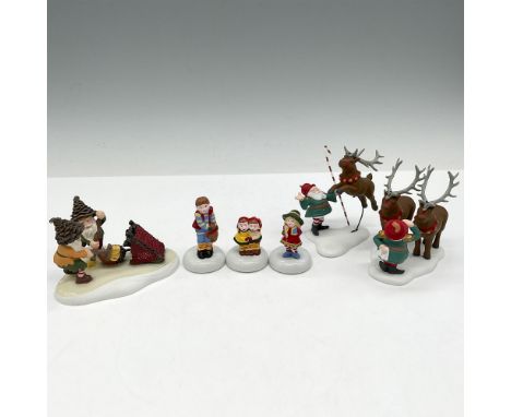 Hand painted porcelain figures to set in village scenes. Lot includes - 3 figures Photo with Santa; 1 figure Nuts About Broom